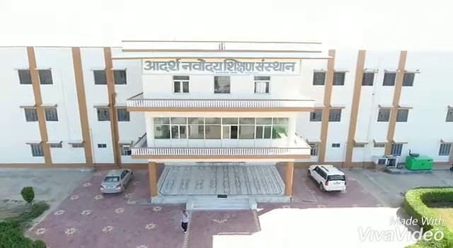 Adharsh Navodaya Public School logo